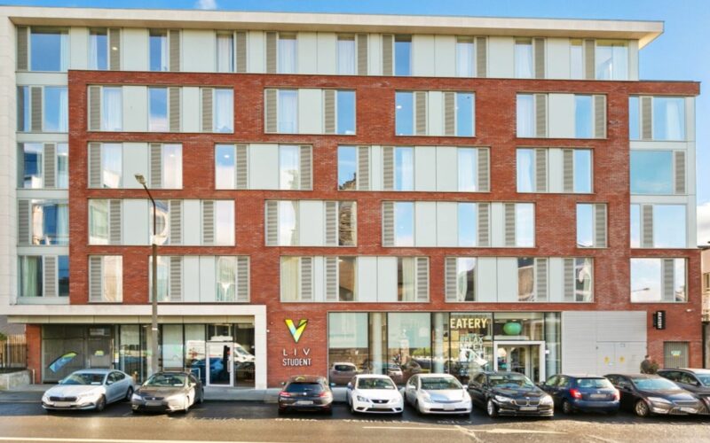 A low rise PBSA building on Church Street in Dublin with a white stone and brick facade