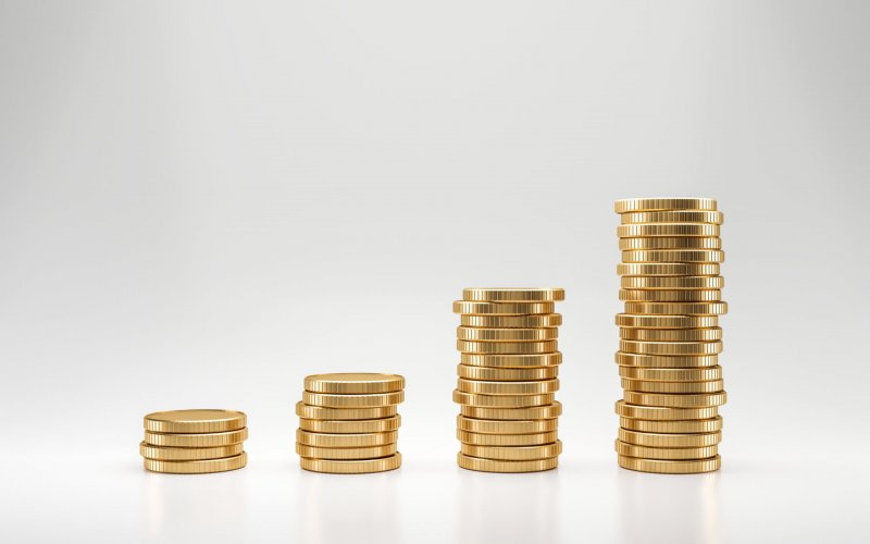 Stack,Of,Golden,Coins,On,White,Background,With,Earning,Profit