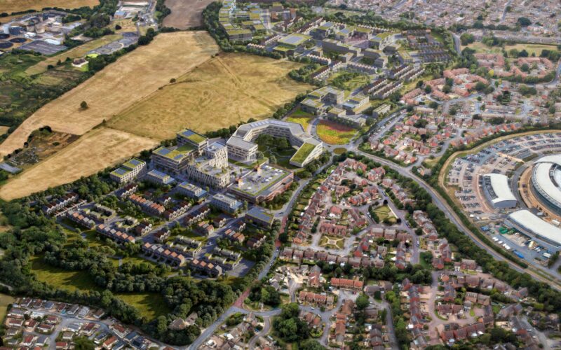CGI aerial view showing new homes surrounding a commercial hub with green fields in the distance