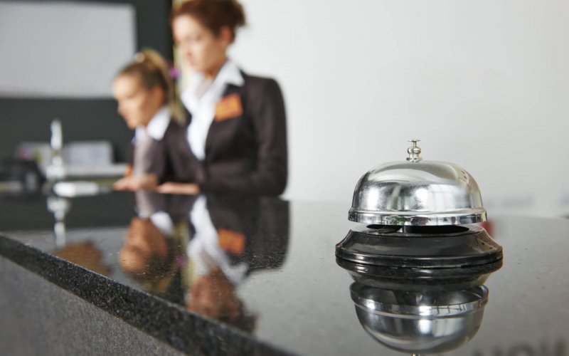 Modern,Luxury,Hotel,Reception,Counter,Desk,With,Bell