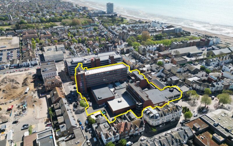 Aerial view of Worthing town centre with a yellow outline surrounding the Guildbourne Centre