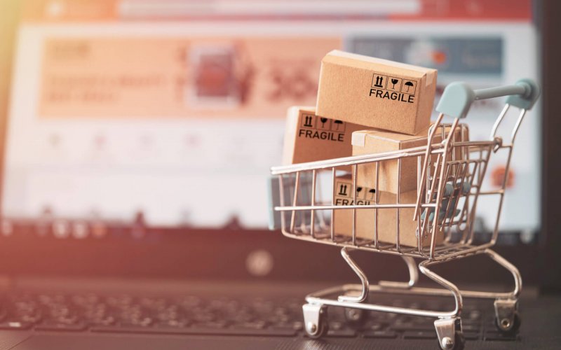 Small,Cartons,Box,With,Shopping,Trolley,On,Computer,Laptop,For