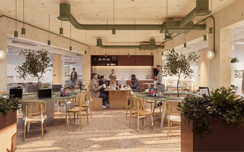 CGI image of a modern office environment featuring tables and chairs and a coffee area
