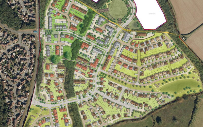 CGI aerial view of a new residential development surrounded by fields