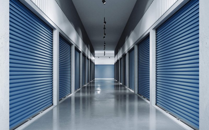 Storage,Facilities,With,Blue,Doors.,Interior,Units.,3d,Rendering