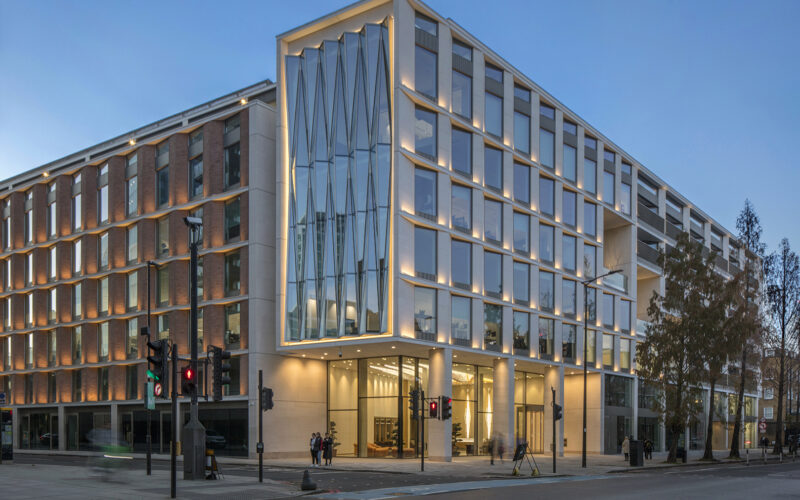 The Lantern office building has a modern facade featuring lots of glass and overlooks a main road