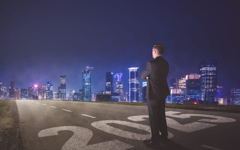 Businessman,Standing,On,The,Road,And,Looking,Ahead,In,2025
