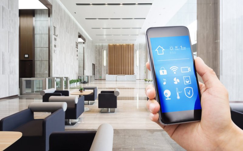 Mobile,Phone,With,App,On,Smart,Home,In,Spacious,Hall